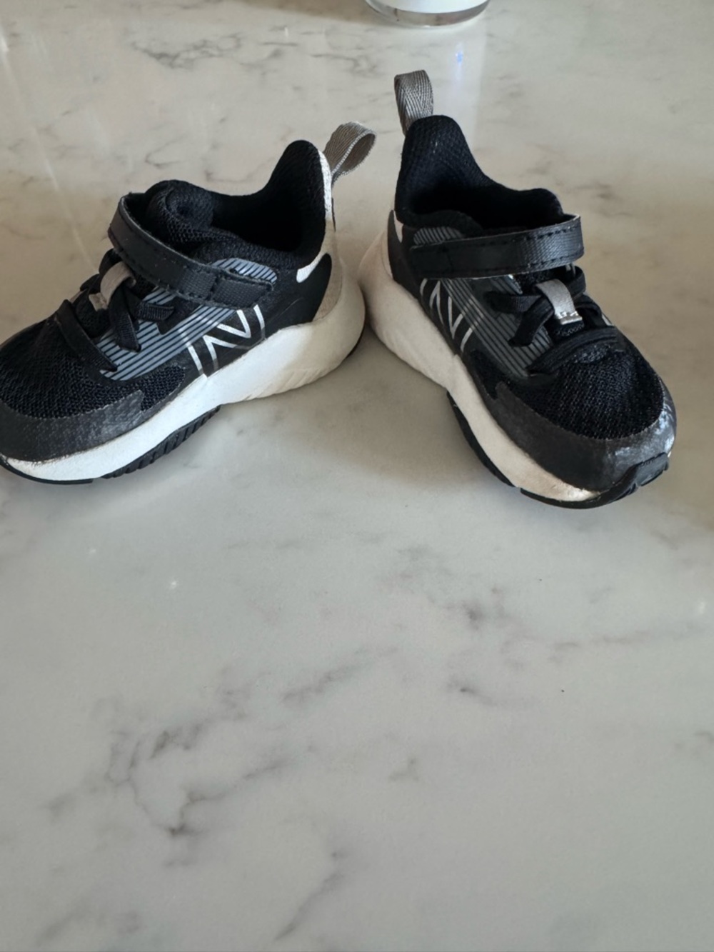 12-18 month size 4  Black and White Sneakers -new balance